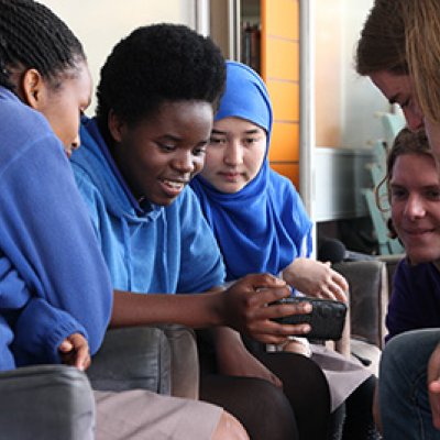 UQ journalism student with Woodridge State High School students. Photo by Daniel Seed